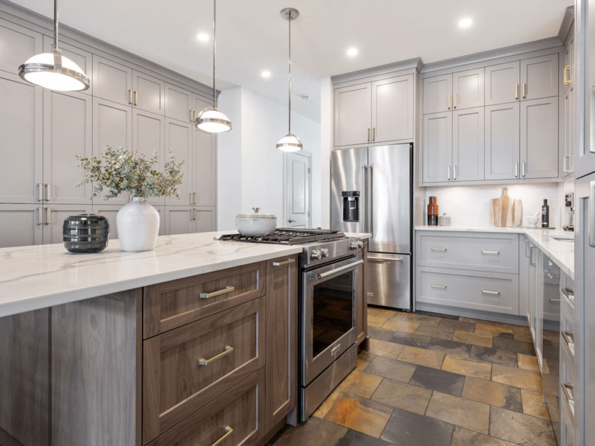 Quartz island and stainless appliances