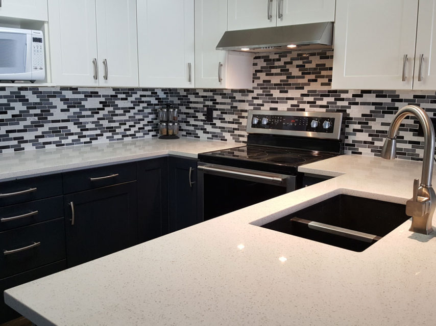 Bright navy and white open-plan kitchen