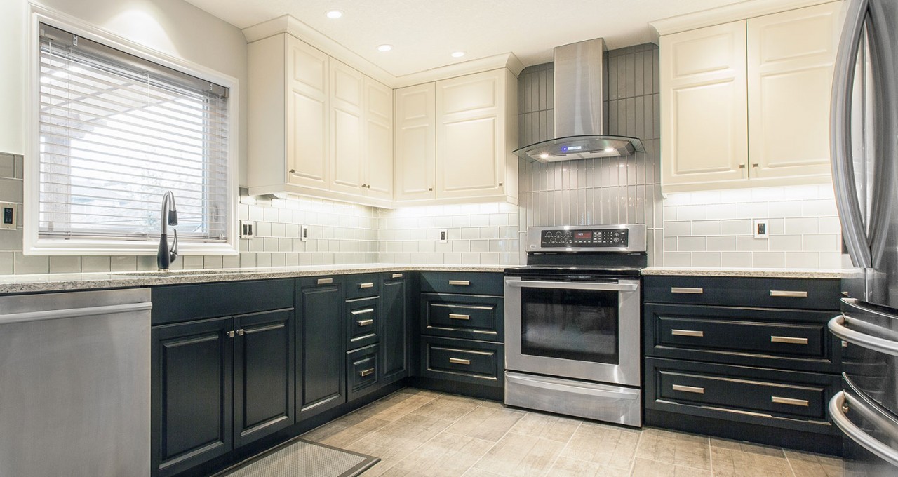 Two-tone cabinetry and quartz counter