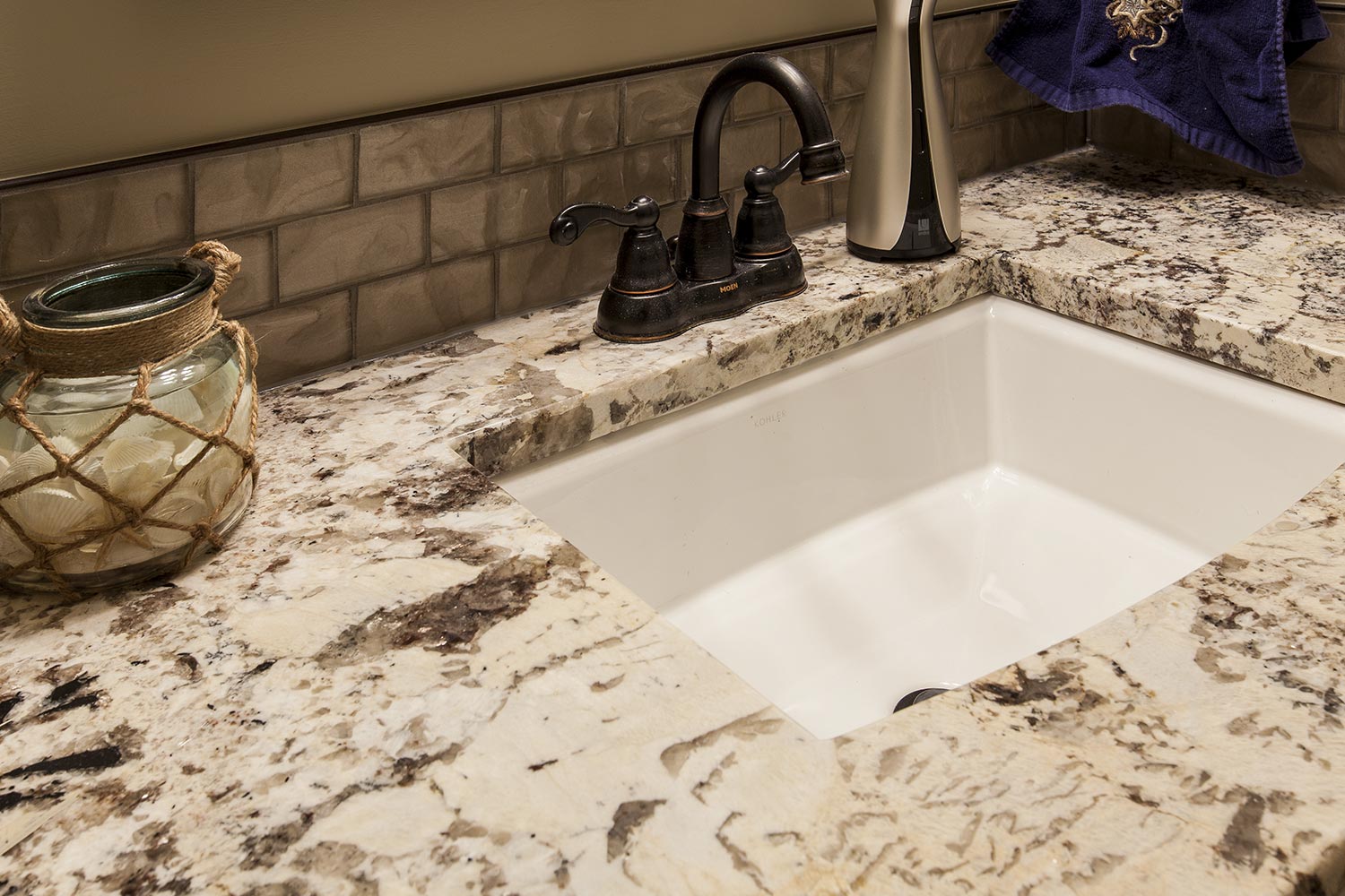 Granite sink with espresso vanity